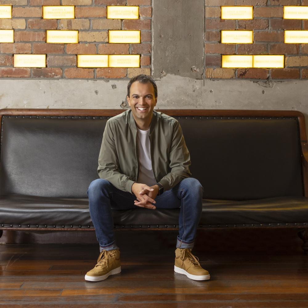 A man sitting on a chair in the middle of it