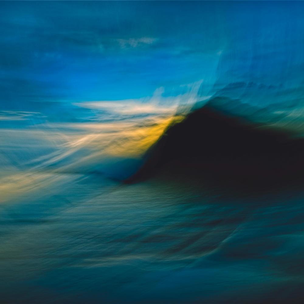 abstract blurry mountain above clouds